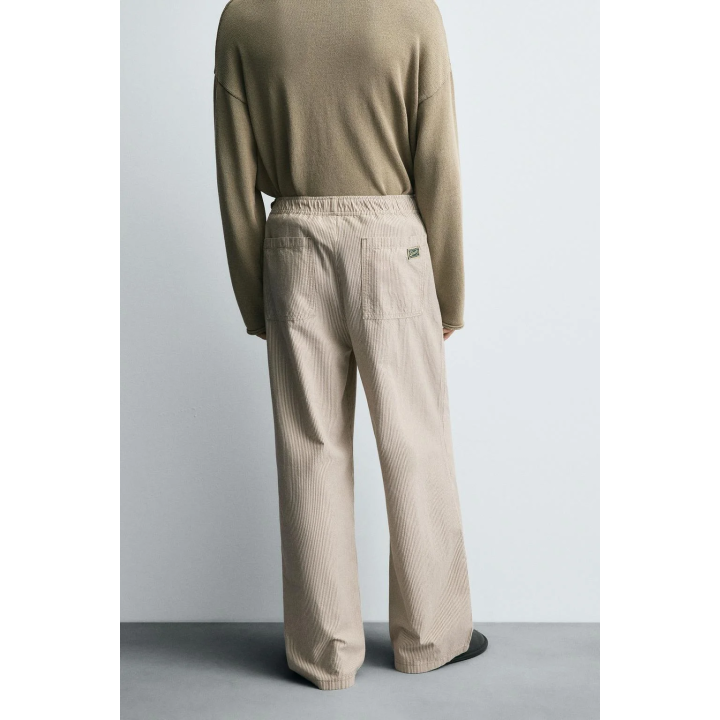 БРЮКИ СВОБОДНОГО КРОЯ В ПОЛОСКУ