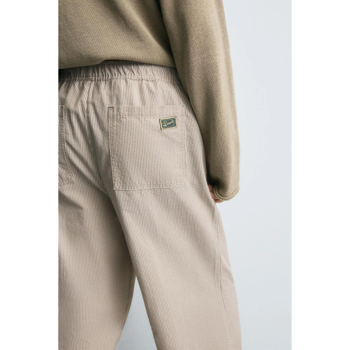 БРЮКИ СВОБОДНОГО КРОЯ В ПОЛОСКУ