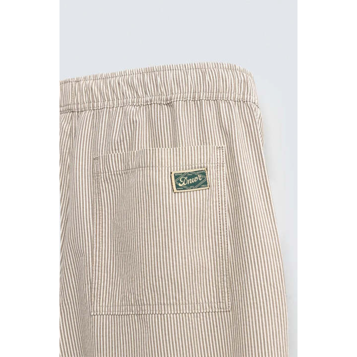 БРЮКИ СВОБОДНОГО КРОЯ В ПОЛОСКУ