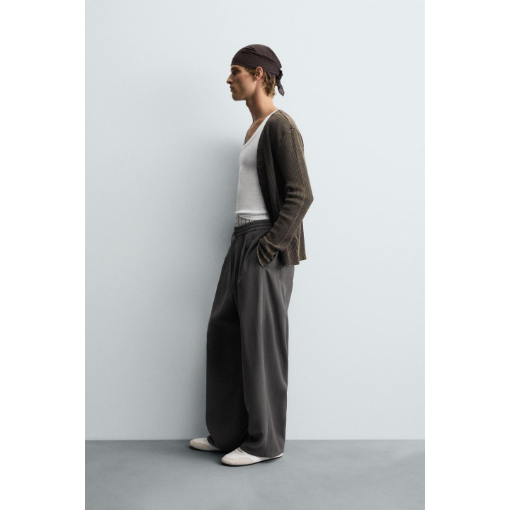 СТРУЯЩИЕСЯ БРЮКИ С ОТДЕЛОЧНОЙ СТРОЧКОЙ