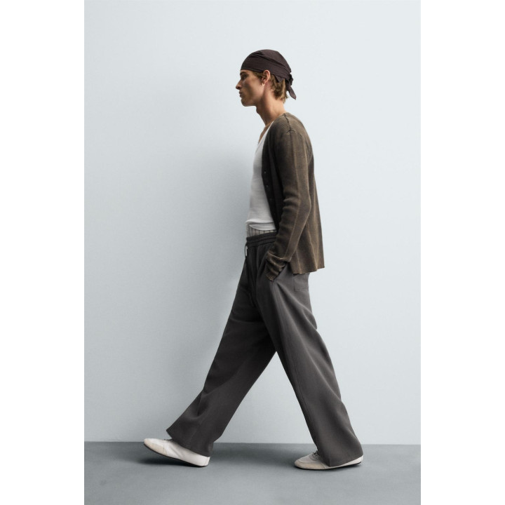 СТРУЯЩИЕСЯ БРЮКИ С ОТДЕЛОЧНОЙ СТРОЧКОЙ