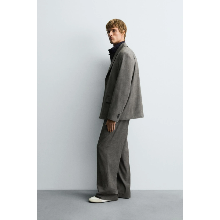 БРЮКИ FLARE FIT КОСТЮМНЫЕ В ЕЛОЧКУ