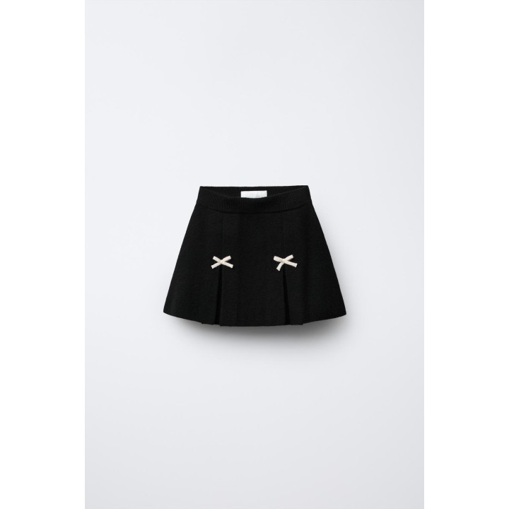 ТРИКОТАЖНАЯ ЮБКА С БАНТАМИ