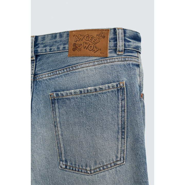 РАСКЛЕШЕННЫЕ ДЖИНСЫ С РАЗРЕЗАМИ HARRY LAMBERT FOR ZARA X DISNEY