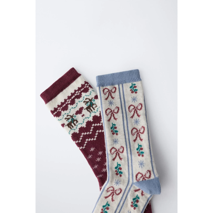 Набор из двух длинных носков с узорами греческого орнамента и бантов