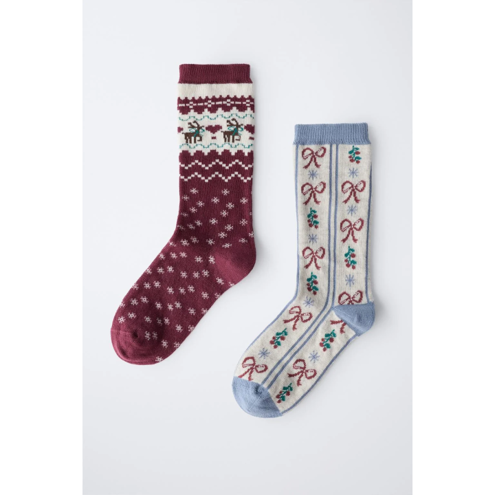 Набор из двух длинных носков с узорами греческого орнамента и бантов