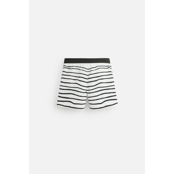 ПЛАВКИ С ПРИНТОМ СРЕДНЕЙ ДЛИНЫ © OTIS KWAME KYE QUAICOE