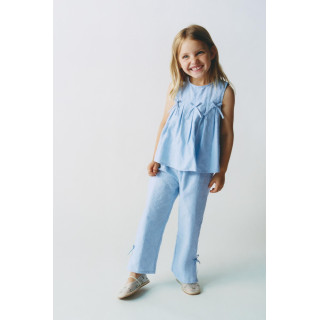 БРЮКИ С ВЫШИВКОЙ В ВИДЕ БАНТОВ