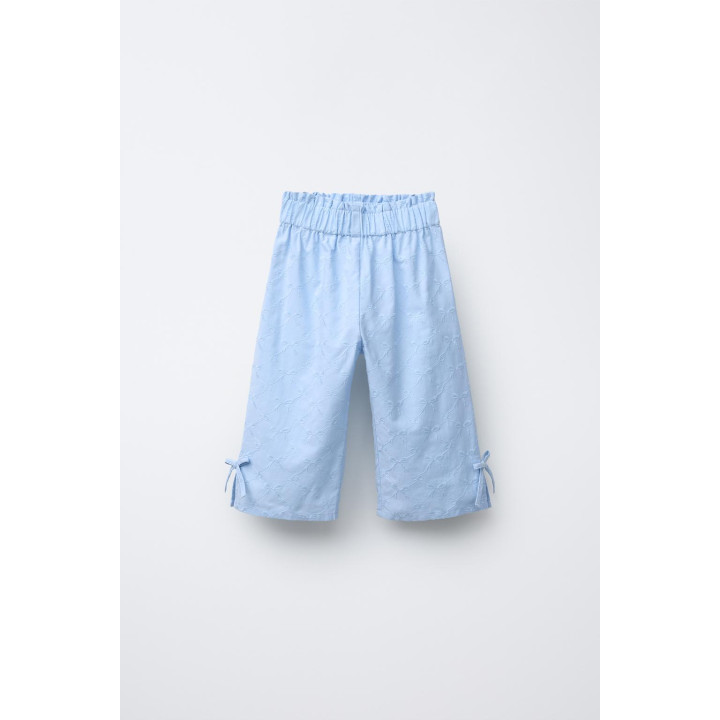 БРЮКИ С ВЫШИВКОЙ В ВИДЕ БАНТОВ