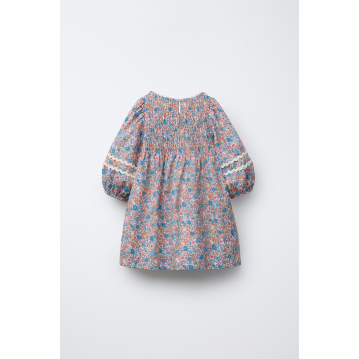 ПЛАТЬЕ С ЦВЕТОЧНЫМ ПРИНТОМ И ВОЛНИСТОЙ ОТДЕЛКОЙ