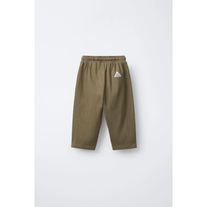 БРЮКИ С ТЕКСТУРНЫМ РИСУНКОМ И НАШИВКОЙ