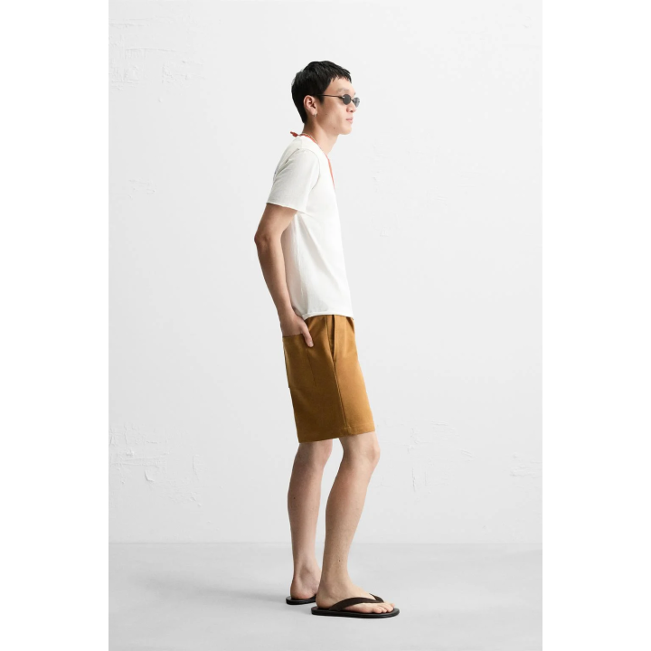 ФУТБОЛКА ИЗ ТКАНИ С ЭФФЕКТОМ ПОТЕРТОСТИ С НАДПИСЬЮ