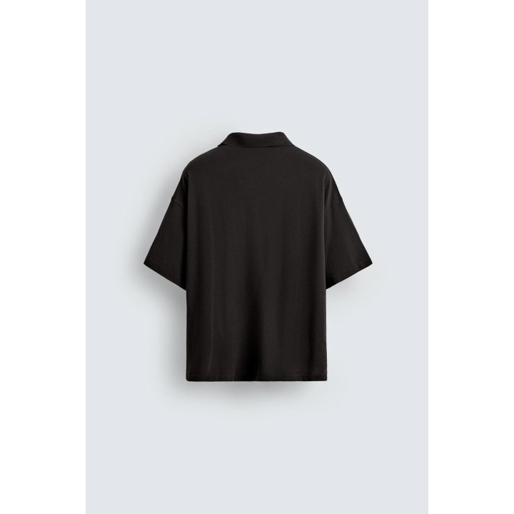 ПОЛО С ЭФФЕКТОМ СТИРКИ И ПРИНТОМ С ТЕКСТОМ