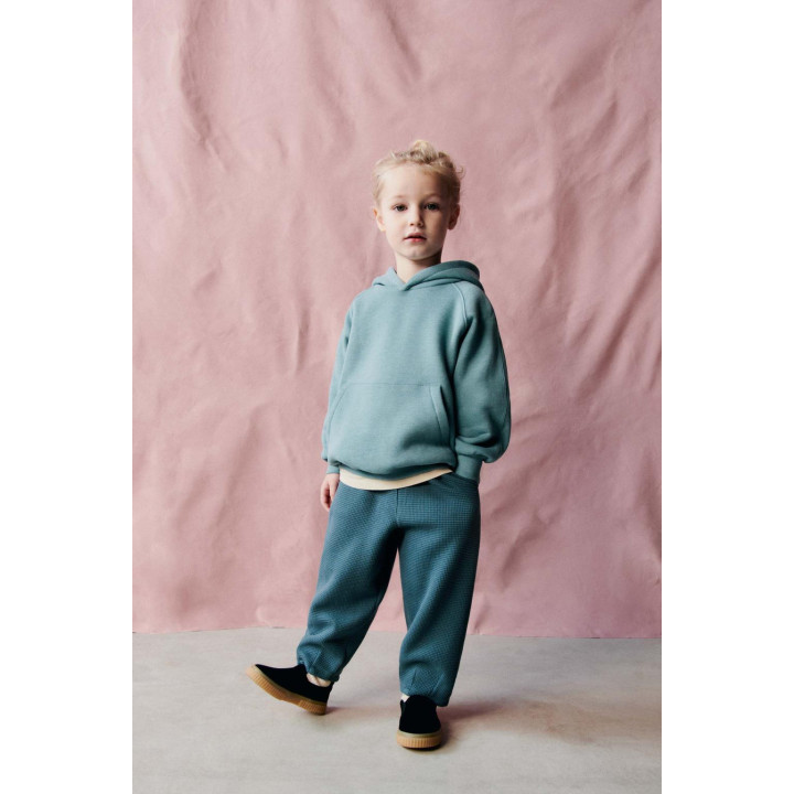 БРЮКИ ИЗ РИФЛЕНОЙ ТКАНИ