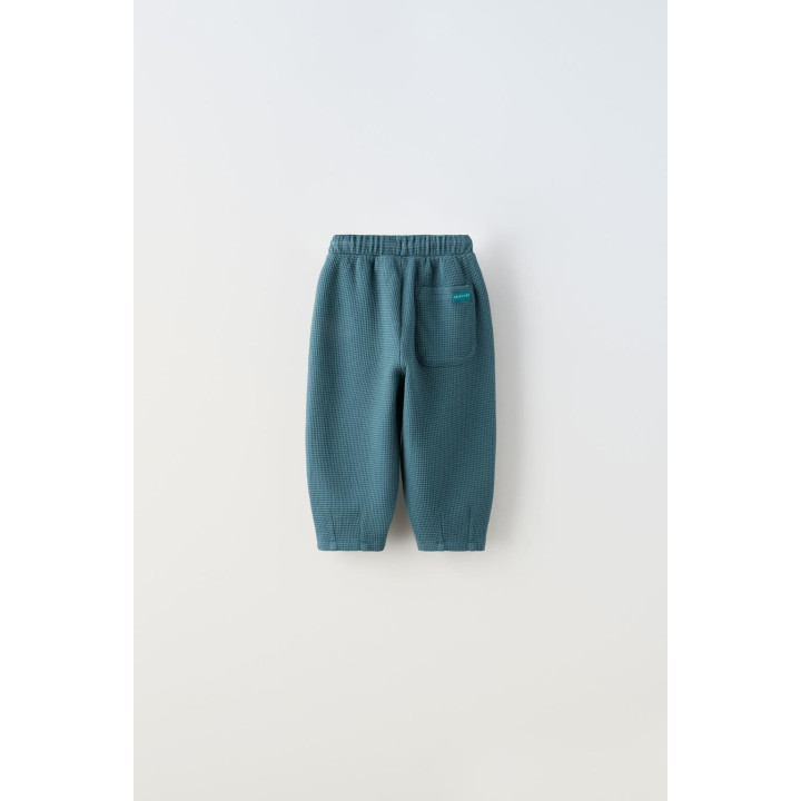 БРЮКИ ИЗ РИФЛЕНОЙ ТКАНИ