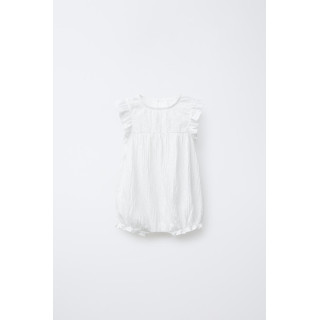 Комбинезон с текстурой и швейцарской вышивкой