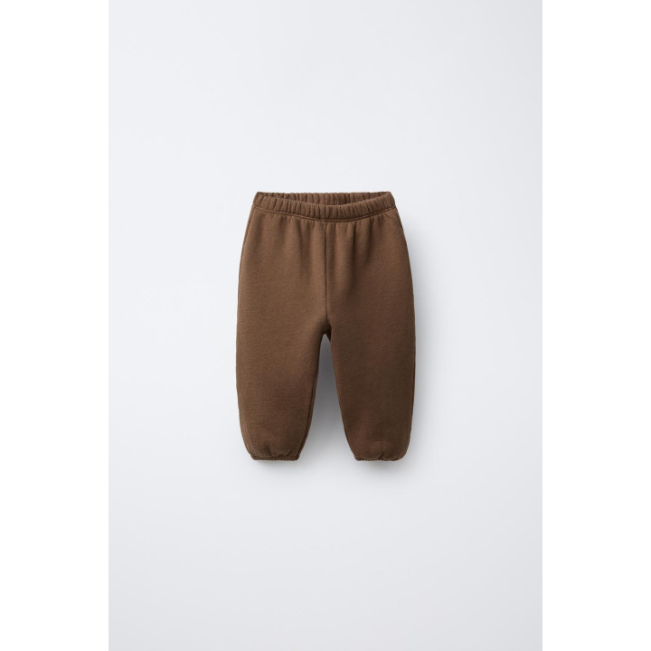 БРЮКИ-ДЖОГГЕРЫ С ЭТИКЕТКОЙ