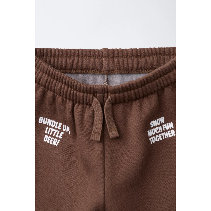 Брюки со стразным текстильным принтом