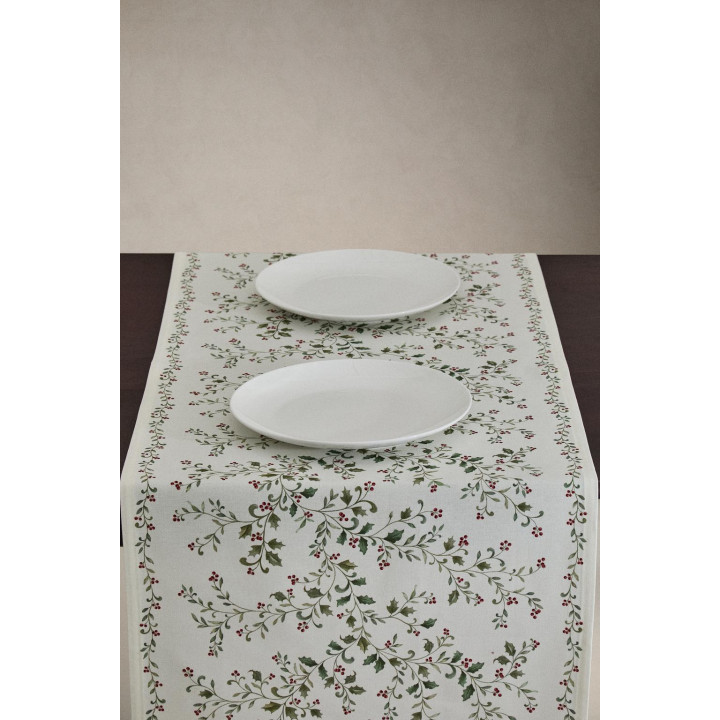 Рождественский бегунок по столу с листьями остролиста