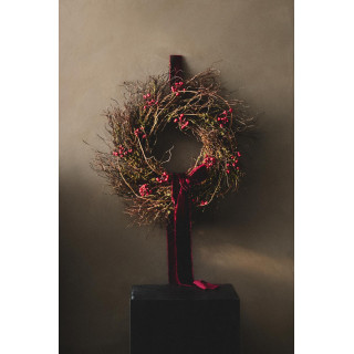 Рождественский венок с декоративными сушеными листьями и цветами