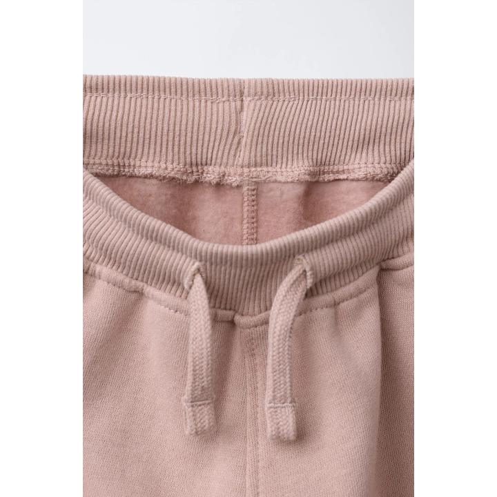 БРЮКИ-ДЖОГГЕРЫ С ЛОГОТИПОМ И ФЛОКОВЫМ ПОКРЫТИЕМ