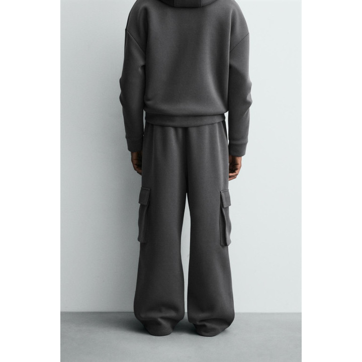 БРЮКИ КАРГО ИЗ НЕОПРЕНА СО СКЛАДКАМИ