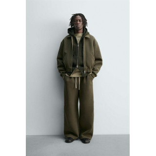 ШИРОКИЕ БРЮКИ ИЗ НЕОПРЕНА С ЗАКЛЕПКАМИ