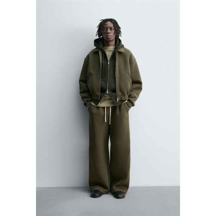 ШИРОКИЕ БРЮКИ ИЗ НЕОПРЕНА С ЗАКЛЕПКАМИ