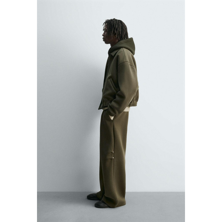 ШИРОКИЕ БРЮКИ ИЗ НЕОПРЕНА С ЗАКЛЕПКАМИ