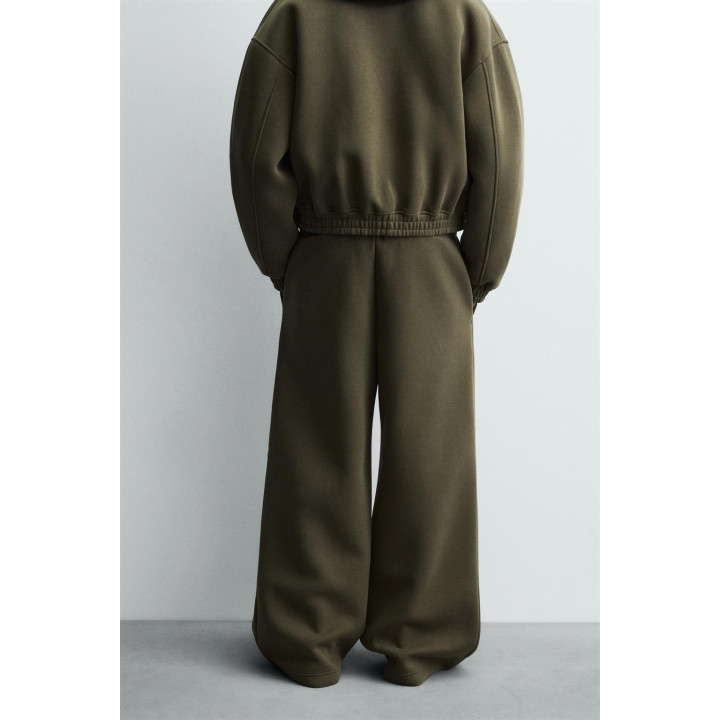 ШИРОКИЕ БРЮКИ ИЗ НЕОПРЕНА С ЗАКЛЕПКАМИ