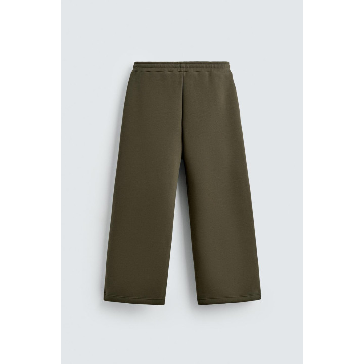 ШИРОКИЕ БРЮКИ ИЗ НЕОПРЕНА С ЗАКЛЕПКАМИ