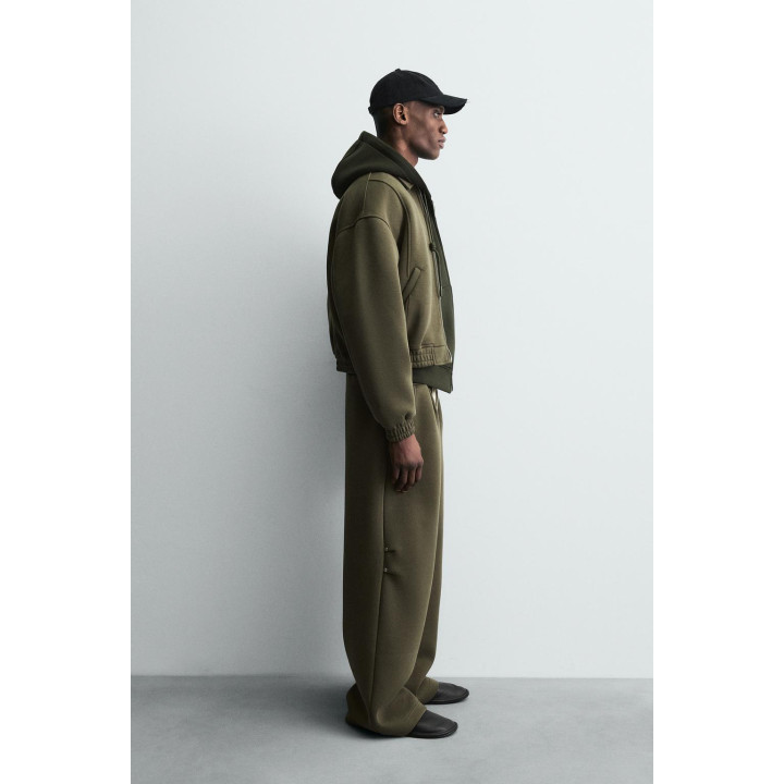 ШИРОКИЕ БРЮКИ ИЗ НЕОПРЕНА С ЗАКЛЕПКАМИ