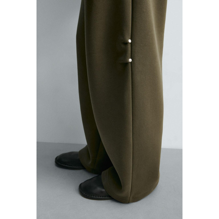 ШИРОКИЕ БРЮКИ ИЗ НЕОПРЕНА С ЗАКЛЕПКАМИ