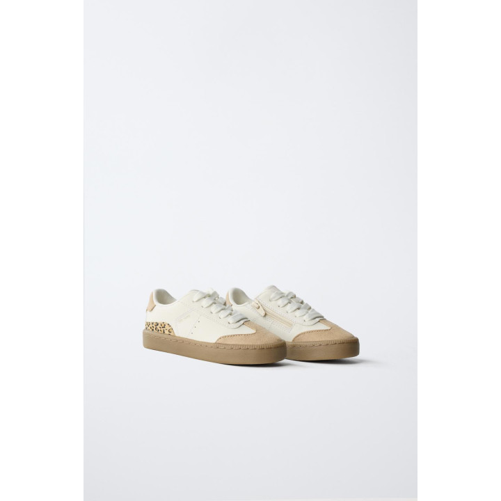 Полосатые кеды со змеиным принтом