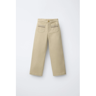 БРЮКИ С ВЫШИВКОЙ НА КАРМАНАХ