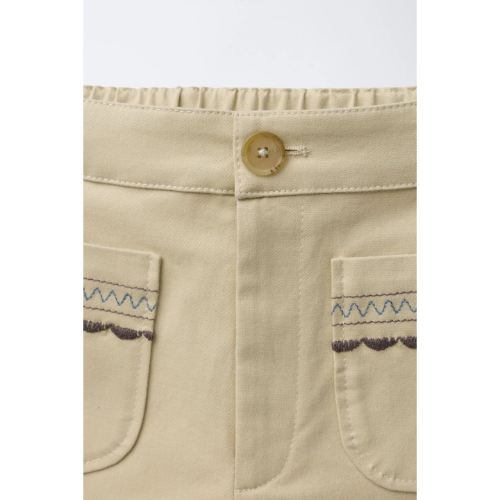 БРЮКИ С ВЫШИВКОЙ НА КАРМАНАХ