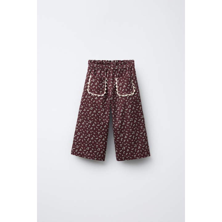 БРЮКИ С ЦВЕТОЧНЫМ ПРИНТОМ