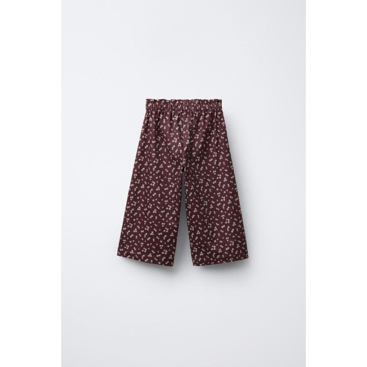 БРЮКИ С ЦВЕТОЧНЫМ ПРИНТОМ