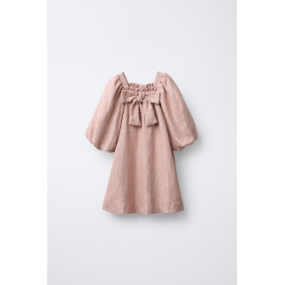 Платье с блестками и бантами