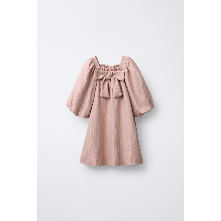 Платье с блестками и бантами