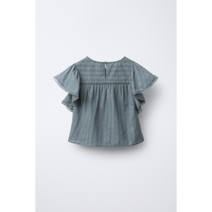 Блузка с оборками из кружева