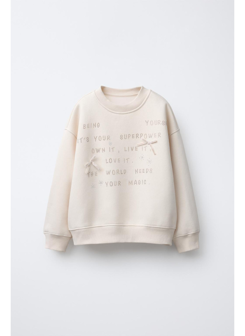 Свитшот с кристаллами и над...