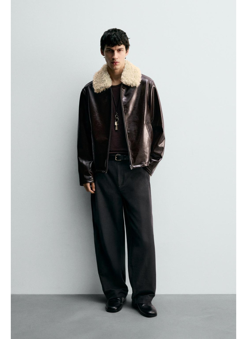 КУРТКА ИЗ ВИНИЛА С КОМБИНИР...