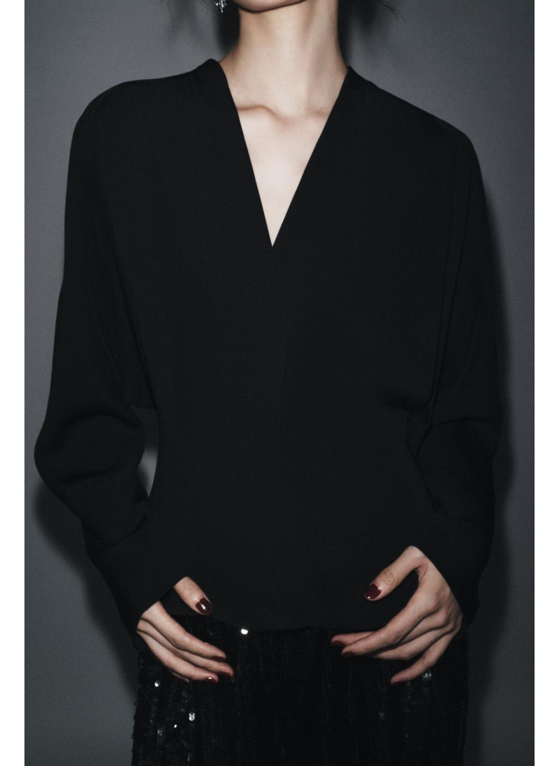 Блуза силуэта 