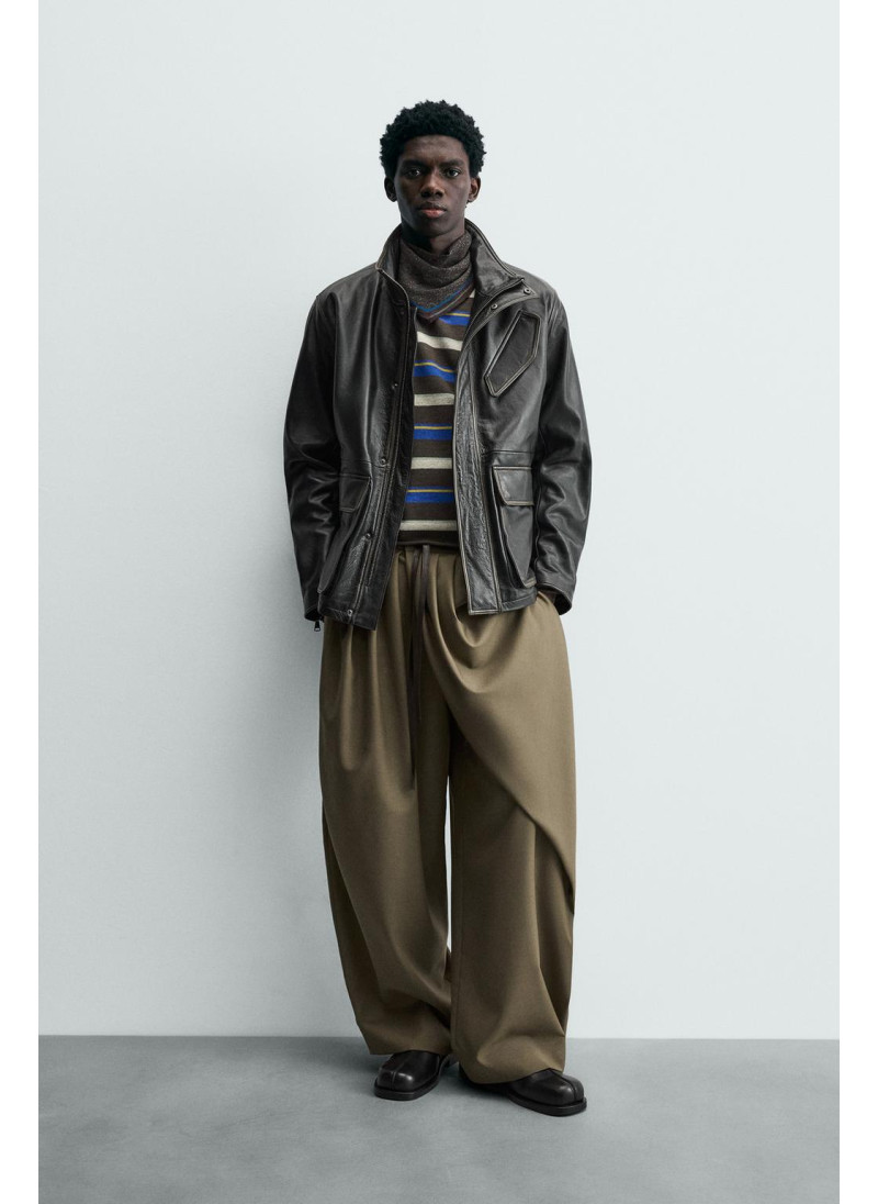 Кожаная куртка с карманами ...