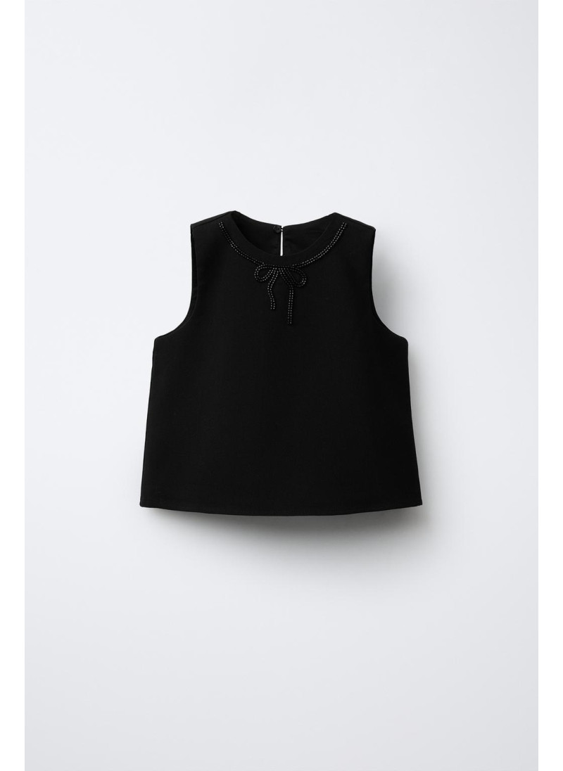 Топ с бантом и бисером