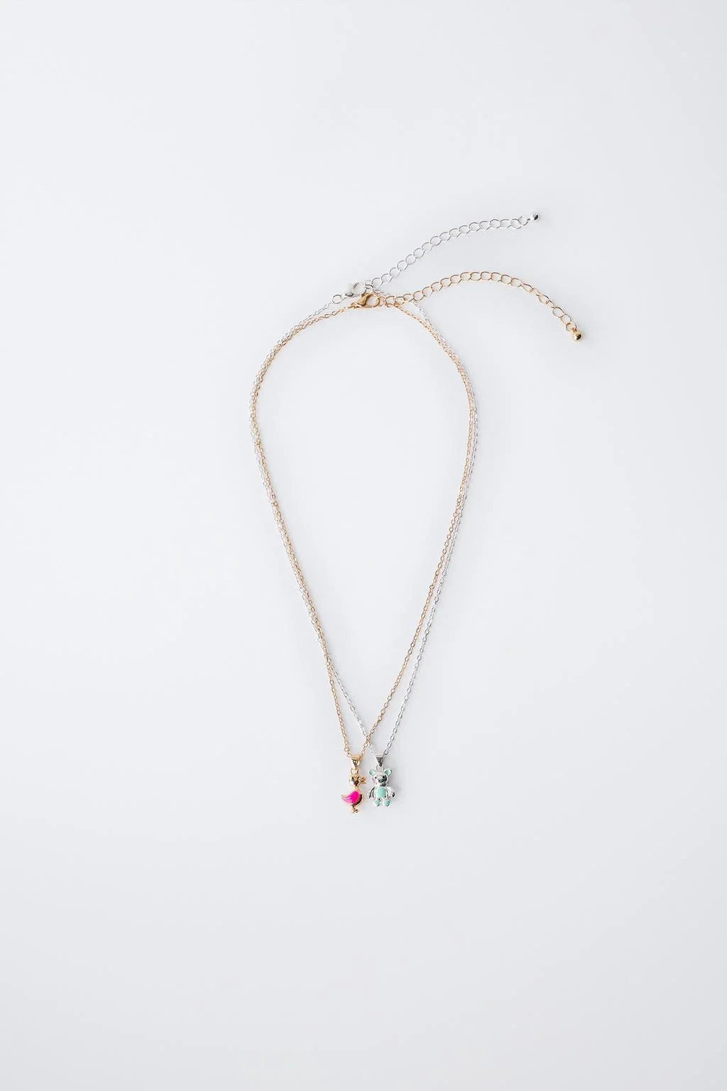 Упаковка двух ожерелий с животными — Брюски