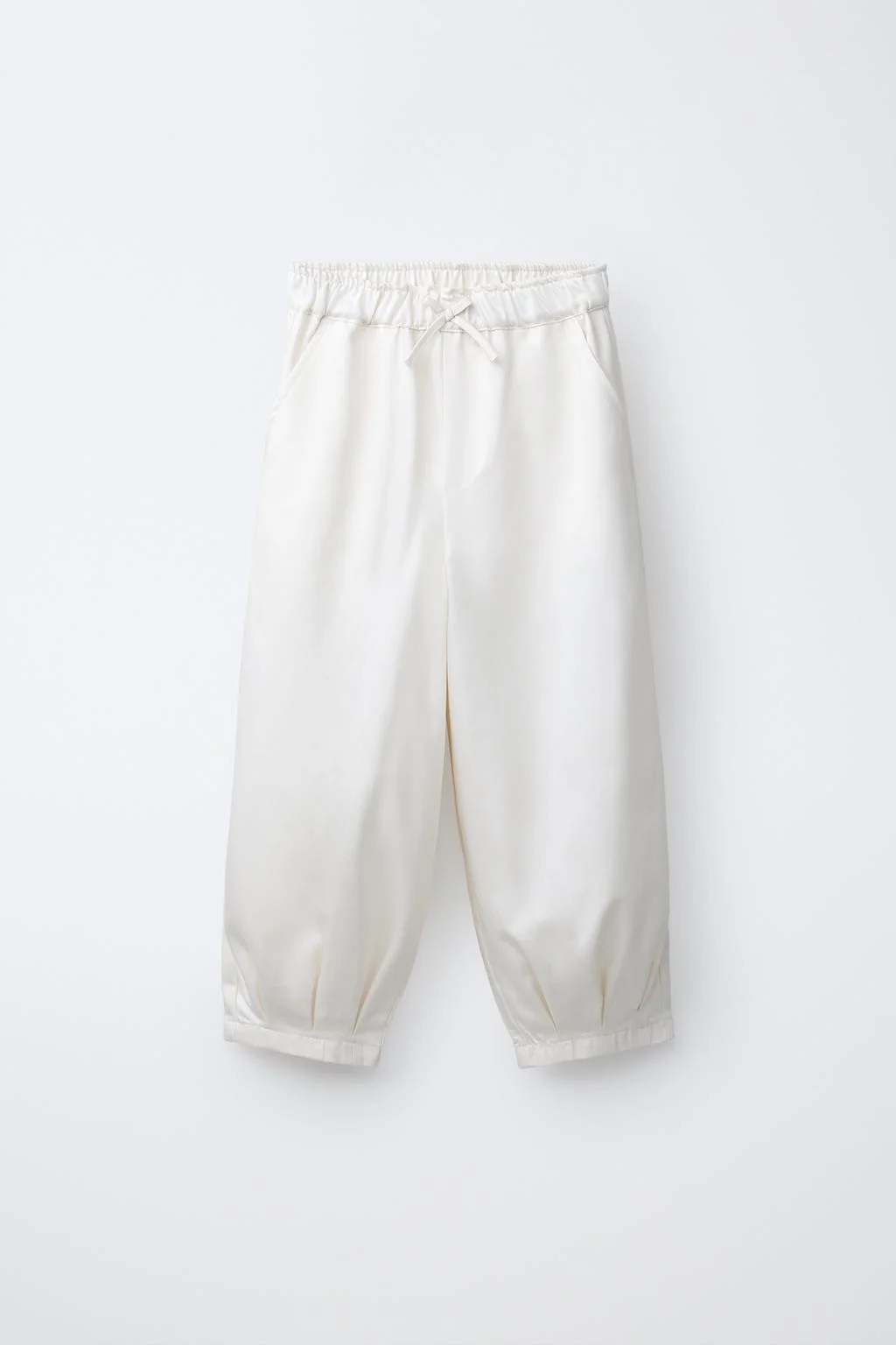 Брюки-бочки с драпировкой