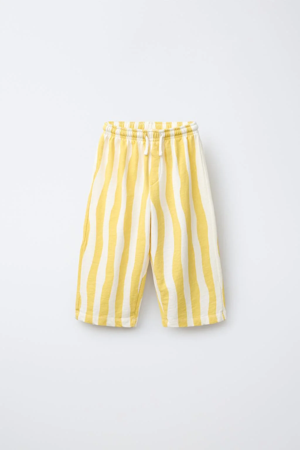 Брюки с волнистыми полосками