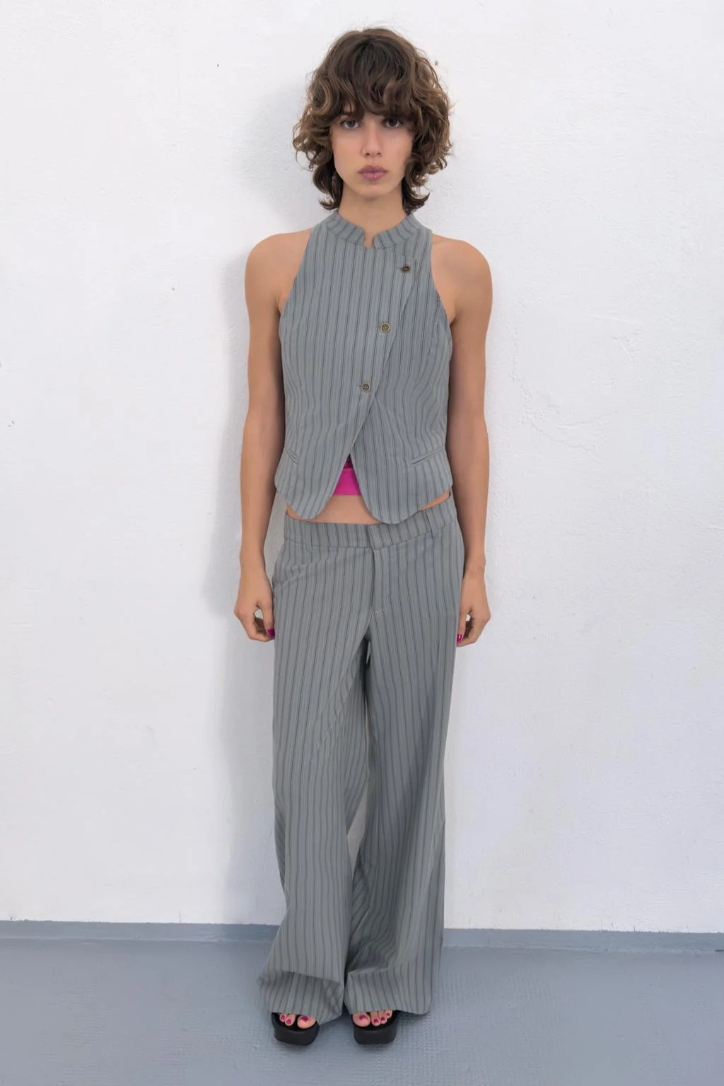 Полосатый двубортный жилет